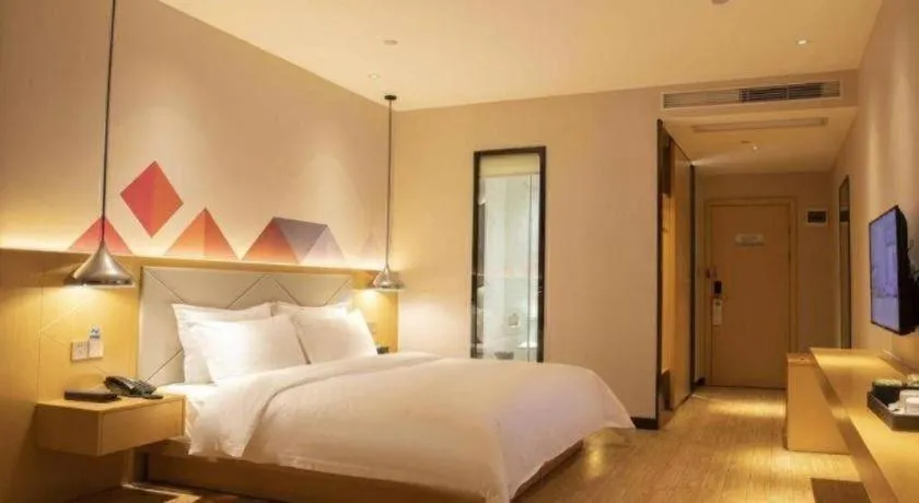 Bed in Borrman Hotel Dongguan Zhongtang