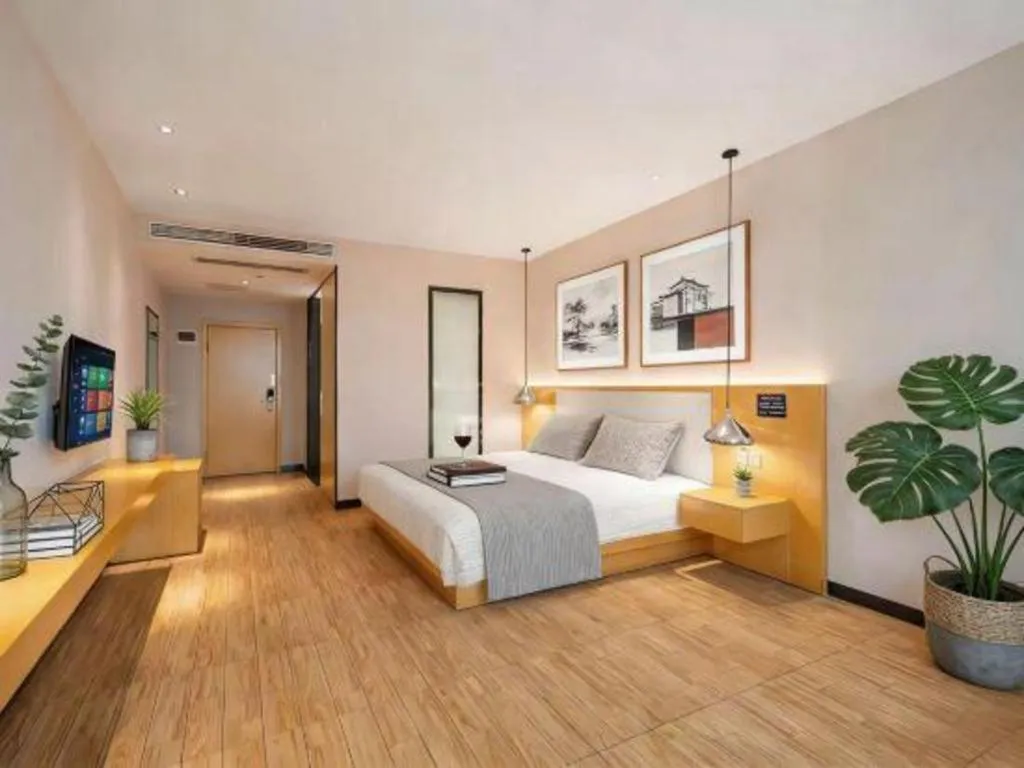 Bed in Borrman Hotel Dongguan Zhongtang