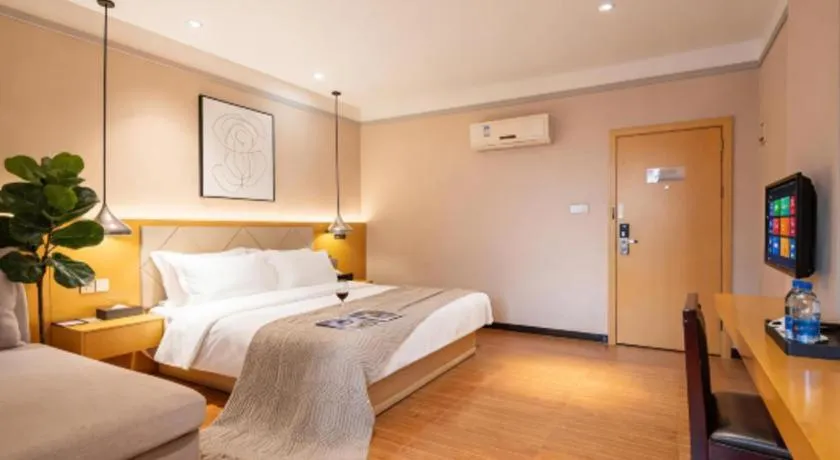 Bed in Borrman Hotel Dongguan Zhongtang