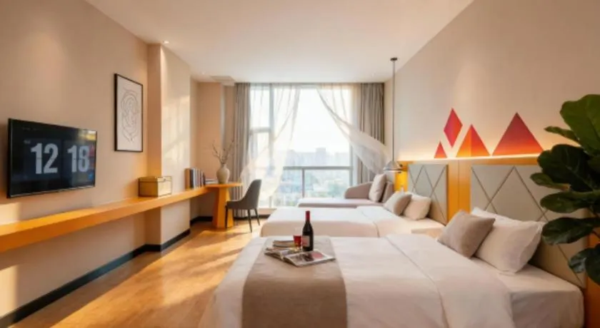 Bed in Borrman Hotel Dongguan Zhongtang