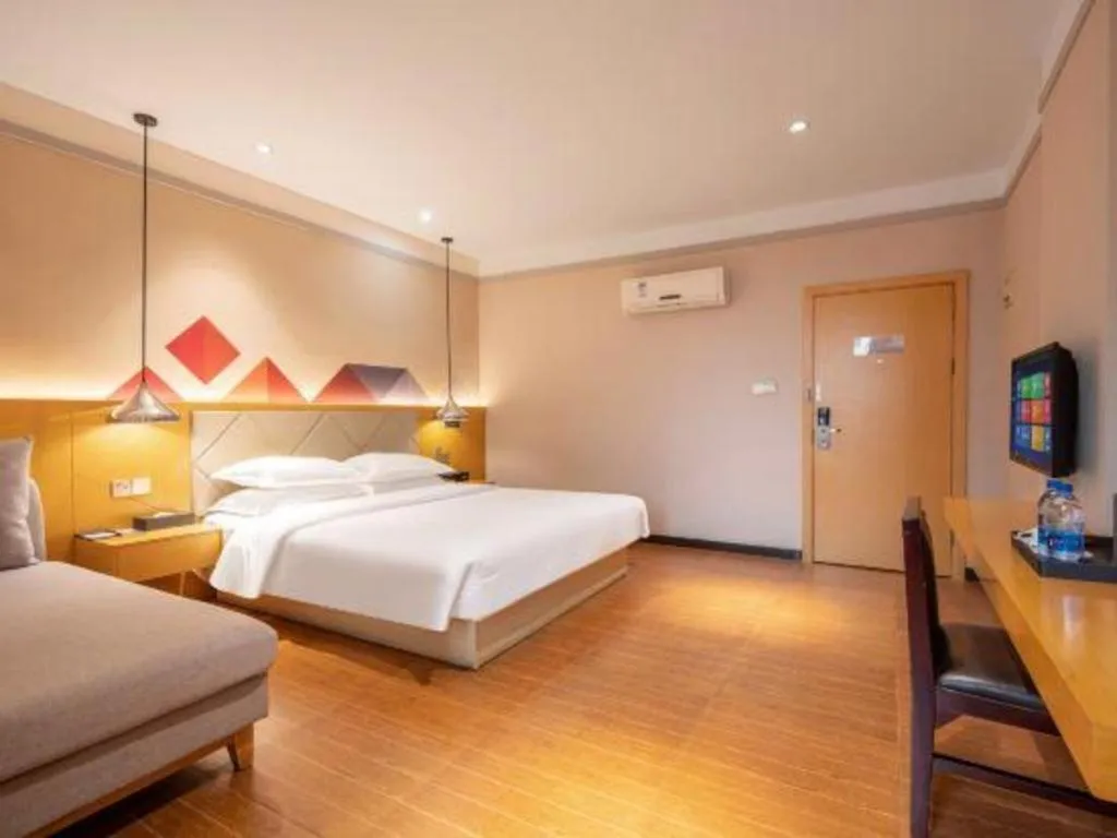 Bed in Borrman Hotel Dongguan Zhongtang