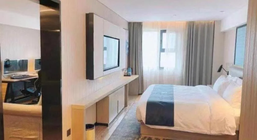 Bed in Echarm Hotel Wuhan Huangpi Xiangyang Avenue