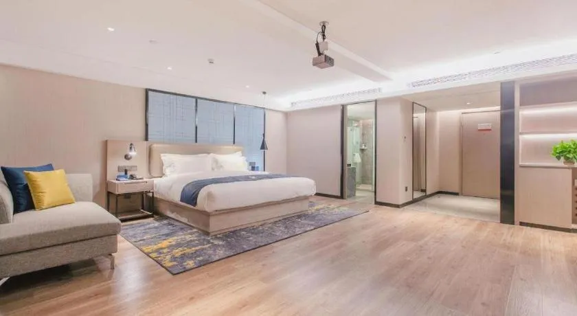 Bed in Echarm Hotel Wuhan Huangpi Xiangyang Avenue