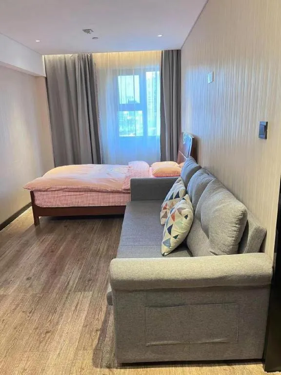 Bed in Echarm Hotel Wuhan Huangpi Xiangyang Avenue