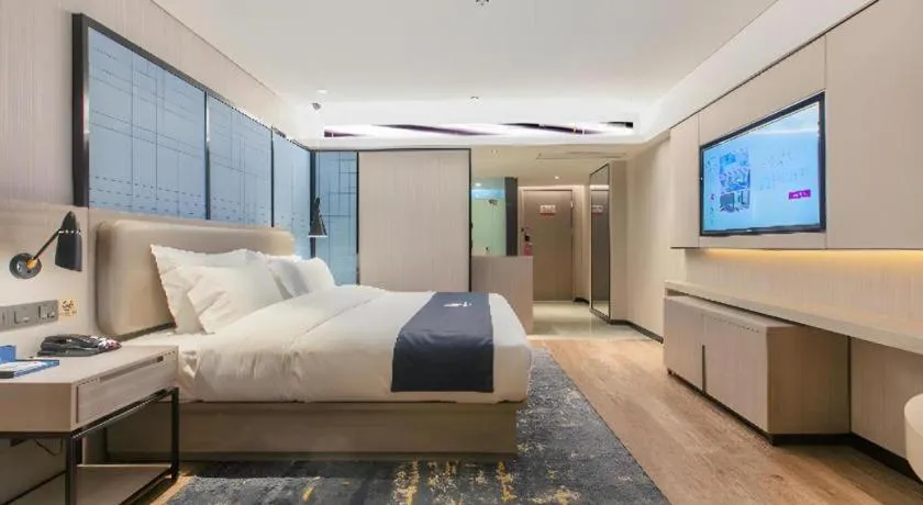 Bed in Echarm Hotel Wuhan Huangpi Xiangyang Avenue