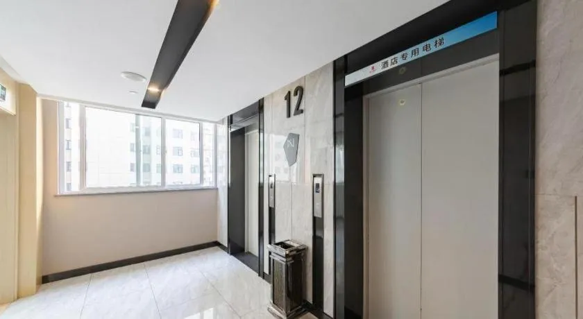 Bed in Echarm Hotel Wuhan Huangpi Xiangyang Avenue