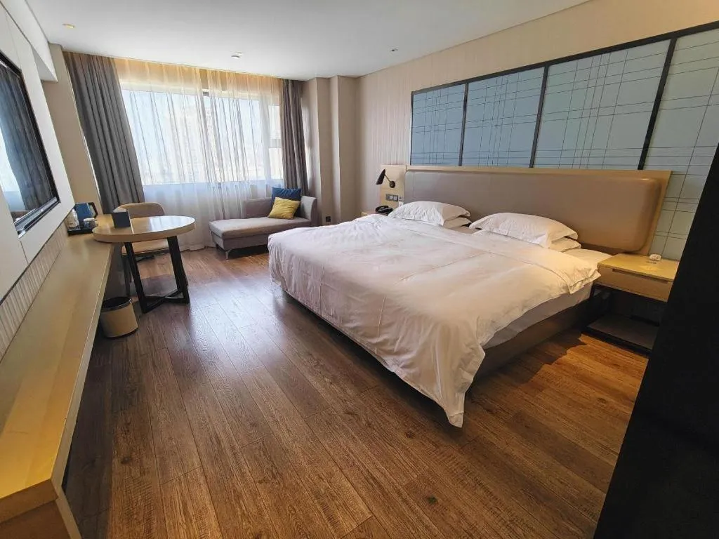 Bed in Echarm Hotel Wuhan Huangpi Xiangyang Avenue