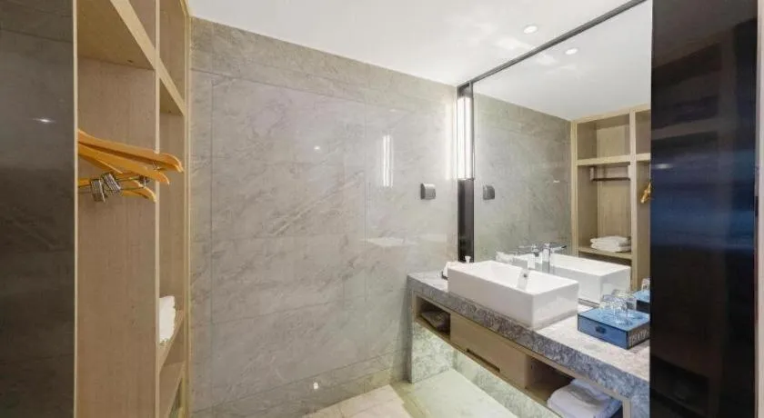 Bed in Echarm Hotel Wuhan Huangpi Xiangyang Avenue