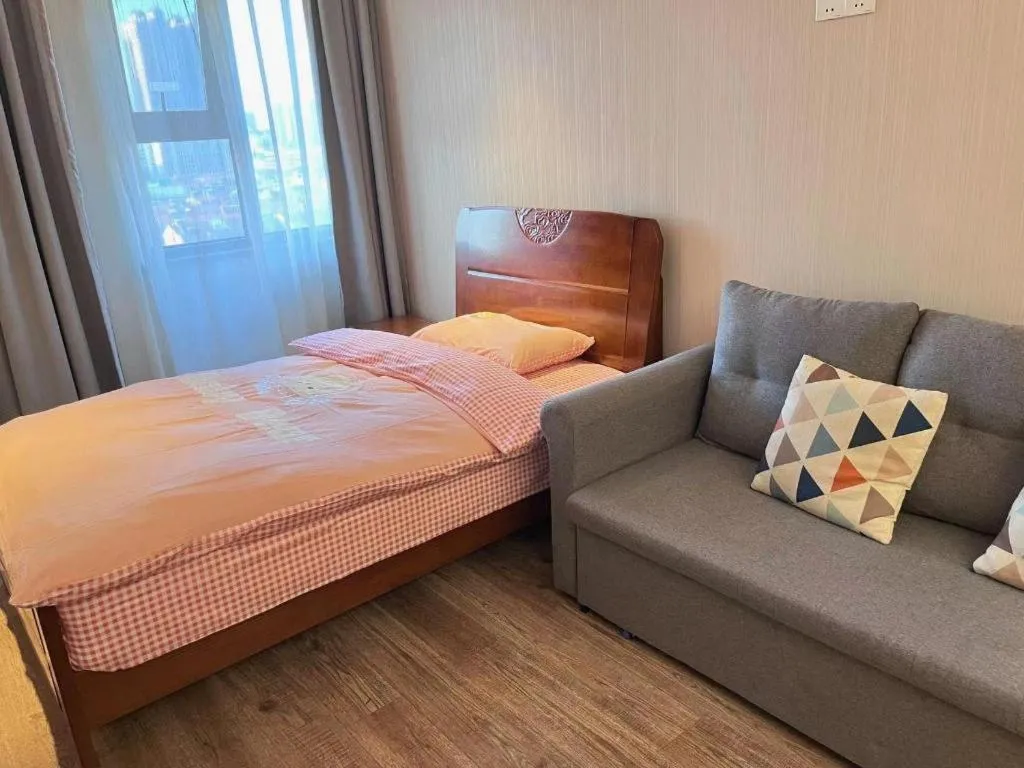 Bed in Echarm Hotel Wuhan Huangpi Xiangyang Avenue