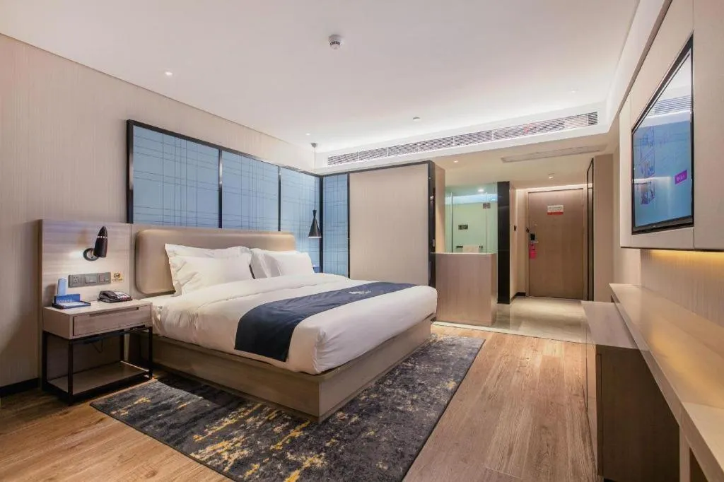Bed in Echarm Hotel Wuhan Huangpi Xiangyang Avenue