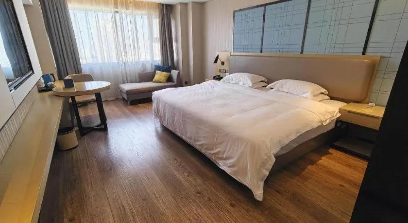 Bed in Echarm Hotel Wuhan Huangpi Xiangyang Avenue