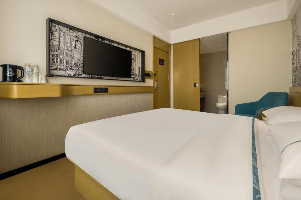 Bed in City Comfort Inn Xingye High-Speed Railway Station