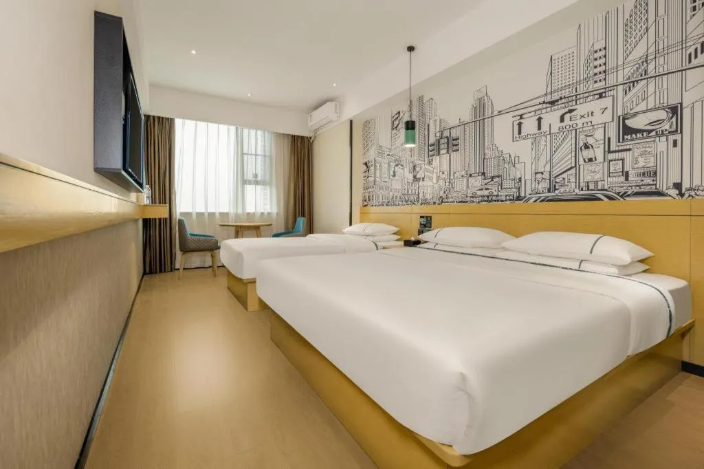 Bed in City Comfort Inn Xingye High-Speed Railway Station