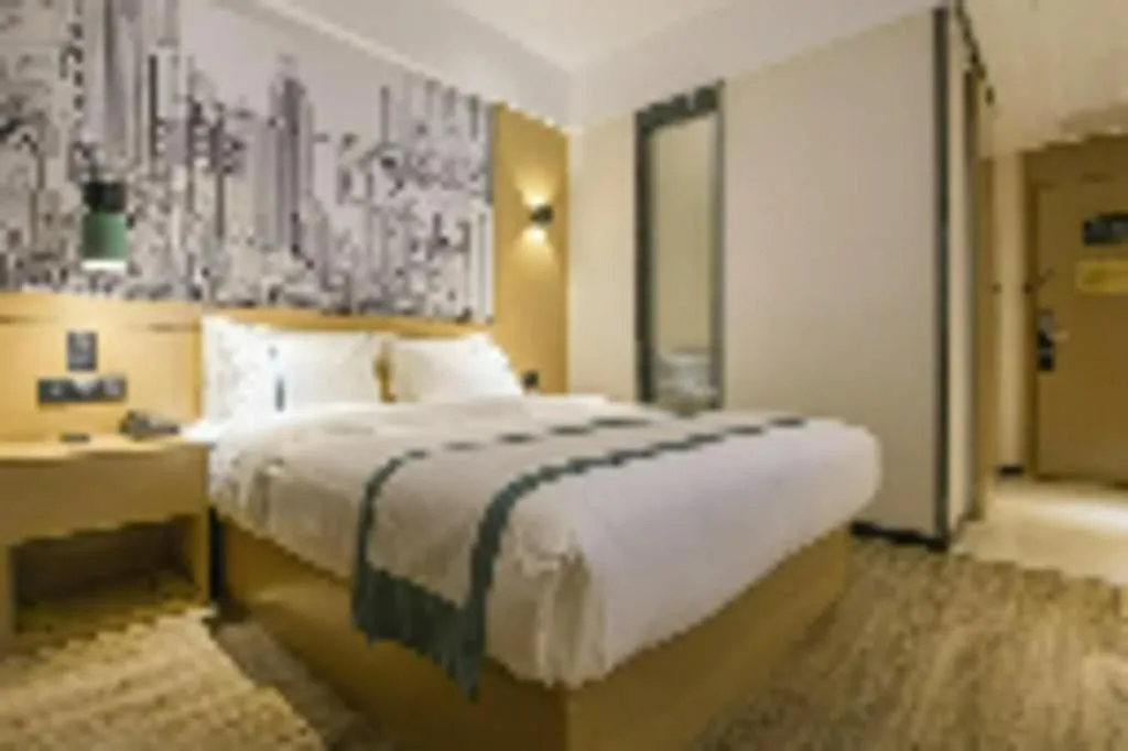 Bed in City Comfort Inn Xingye High-Speed Railway Station