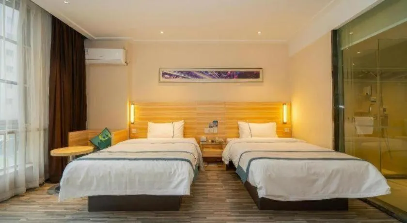 Bed in City Comfort Inn Wuhan Qingshan Jianshi Qingyiju Metro Station