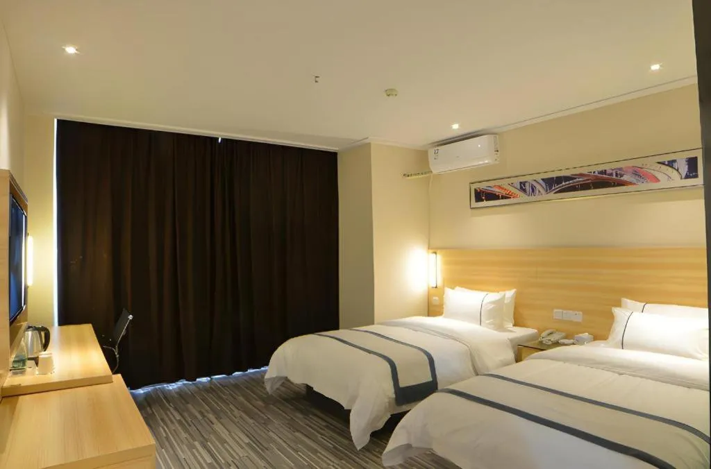 Bed in City Comfort Inn Wuhan Qingshan Jianshi Qingyiju Metro Station