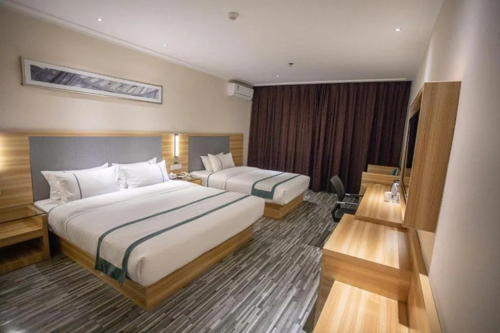 Bed in City Comfort Inn Hengyang Shigu Shuyuan