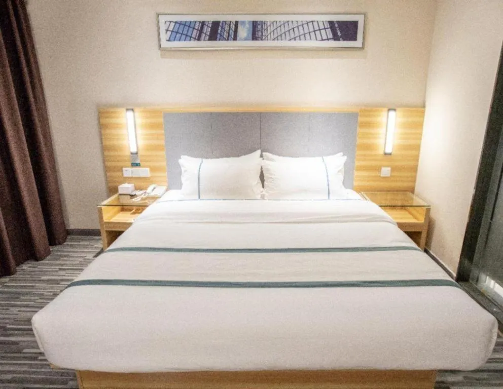 Bed in City Comfort Inn Hengyang Shigu Shuyuan