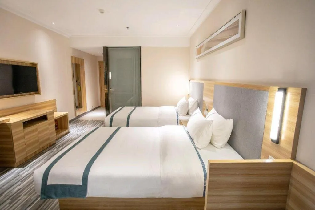 Bed in City Comfort Inn Hengyang Shigu Shuyuan