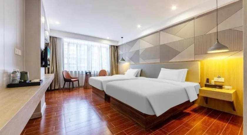 Bed in Borrman Hotel Shaoguan Century East Street Fengcai Building