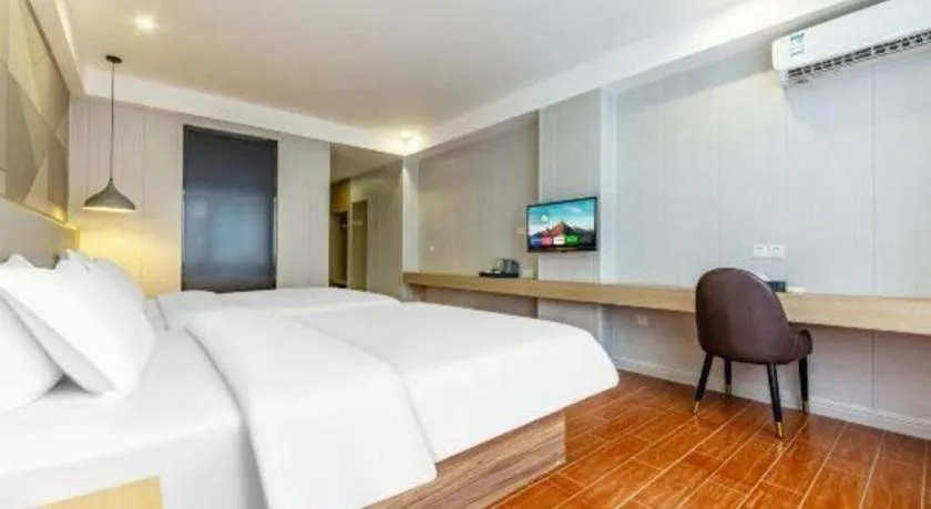 Bed in Borrman Hotel Shaoguan Century East Street Fengcai Building
