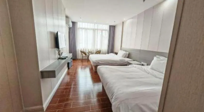 Bed in Borrman Hotel Shaoguan Century East Street Fengcai Building