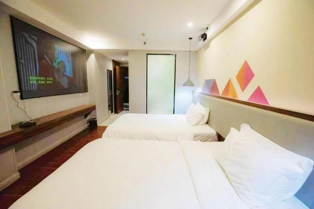 Bed in Borrman Hotel Shaoguan Century East Street Fengcai Building