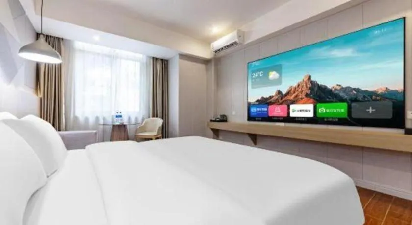 Bed in Borrman Hotel Shaoguan Century East Street Fengcai Building