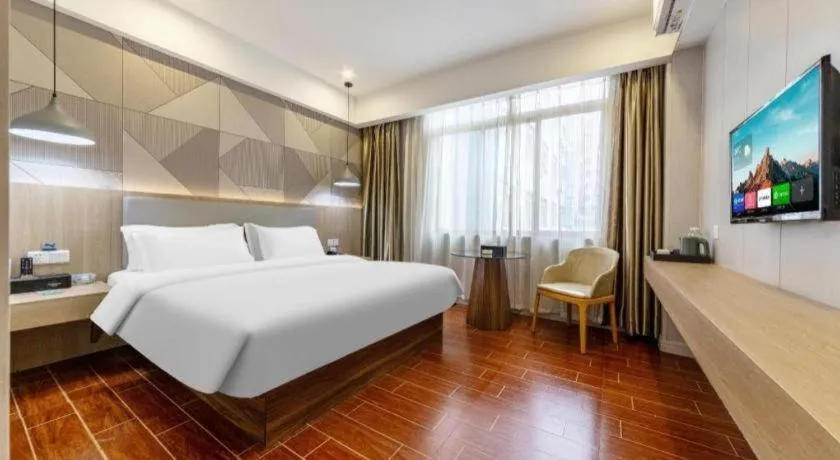 Bed in Borrman Hotel Shaoguan Century East Street Fengcai Building