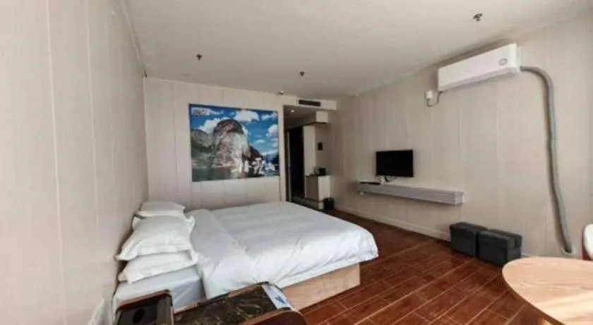 Bed in Borrman Hotel Shaoguan Century East Street Fengcai Building