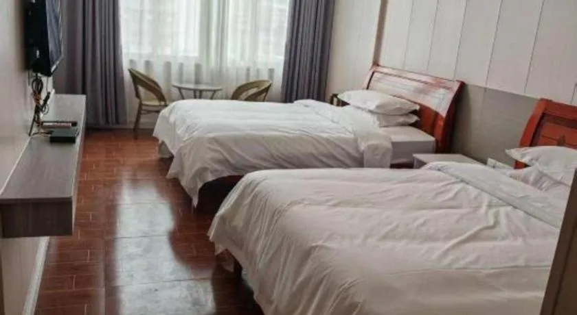 Bed in Borrman Hotel Shaoguan Century East Street Fengcai Building