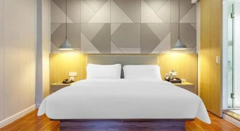 Bed in Borrman Hotel Shaoguan Century East Street Fengcai Building
