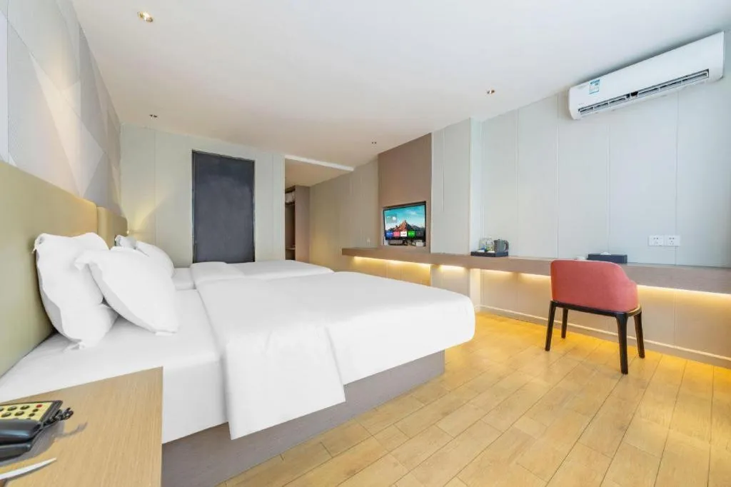 Bed in Borrman Hotel Shaoguan Century East Street Fengcai Building