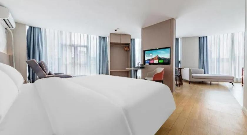 Bed in Borrman Hotel Shaoguan Century East Street Fengcai Building