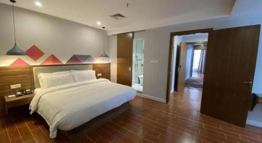 Bed in Borrman Hotel Shaoguan Century East Street Fengcai Building