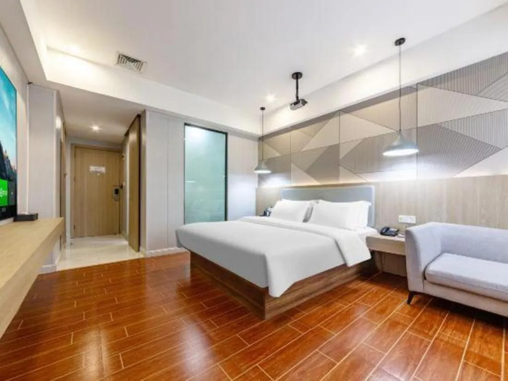 Bed in Borrman Hotel Shaoguan Century East Street Fengcai Building