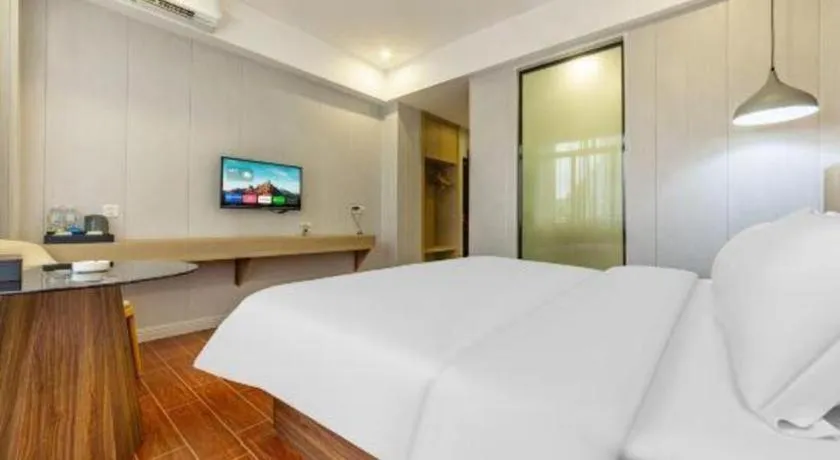 Bed in Borrman Hotel Shaoguan Century East Street Fengcai Building