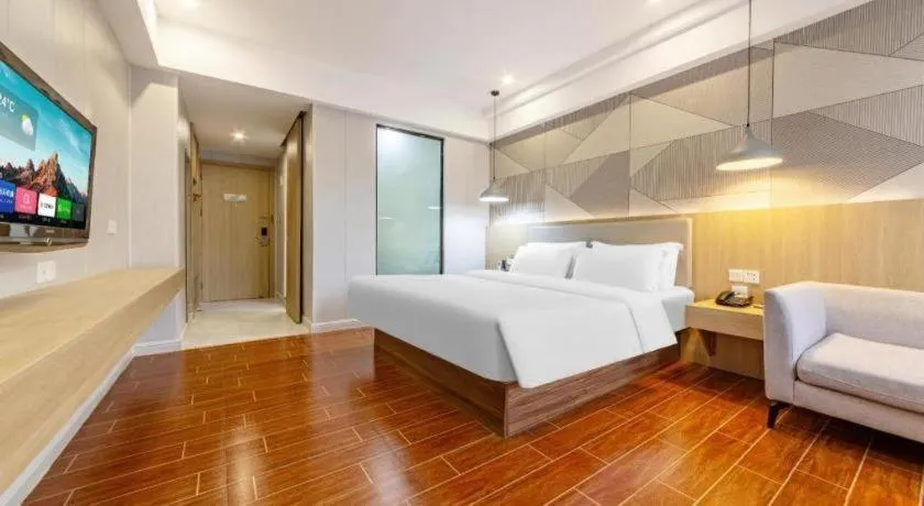 Bed in Borrman Hotel Shaoguan Century East Street Fengcai Building