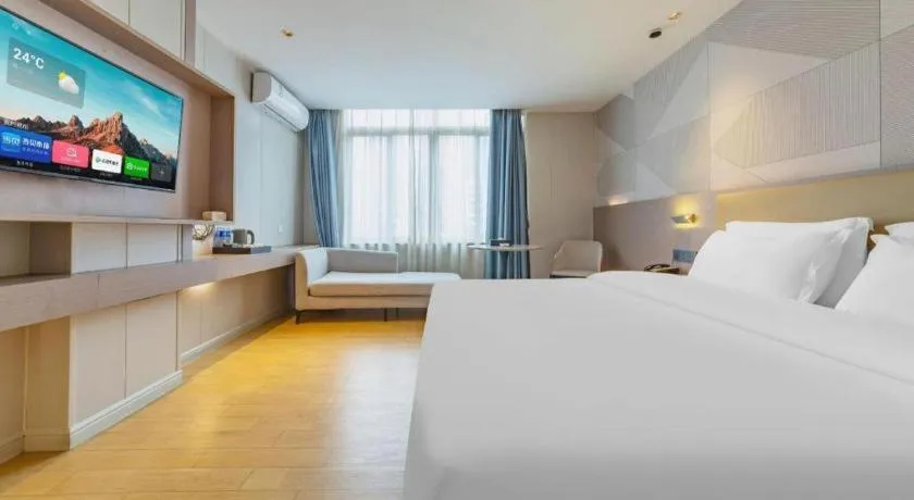 Bed in Borrman Hotel Shaoguan Century East Street Fengcai Building