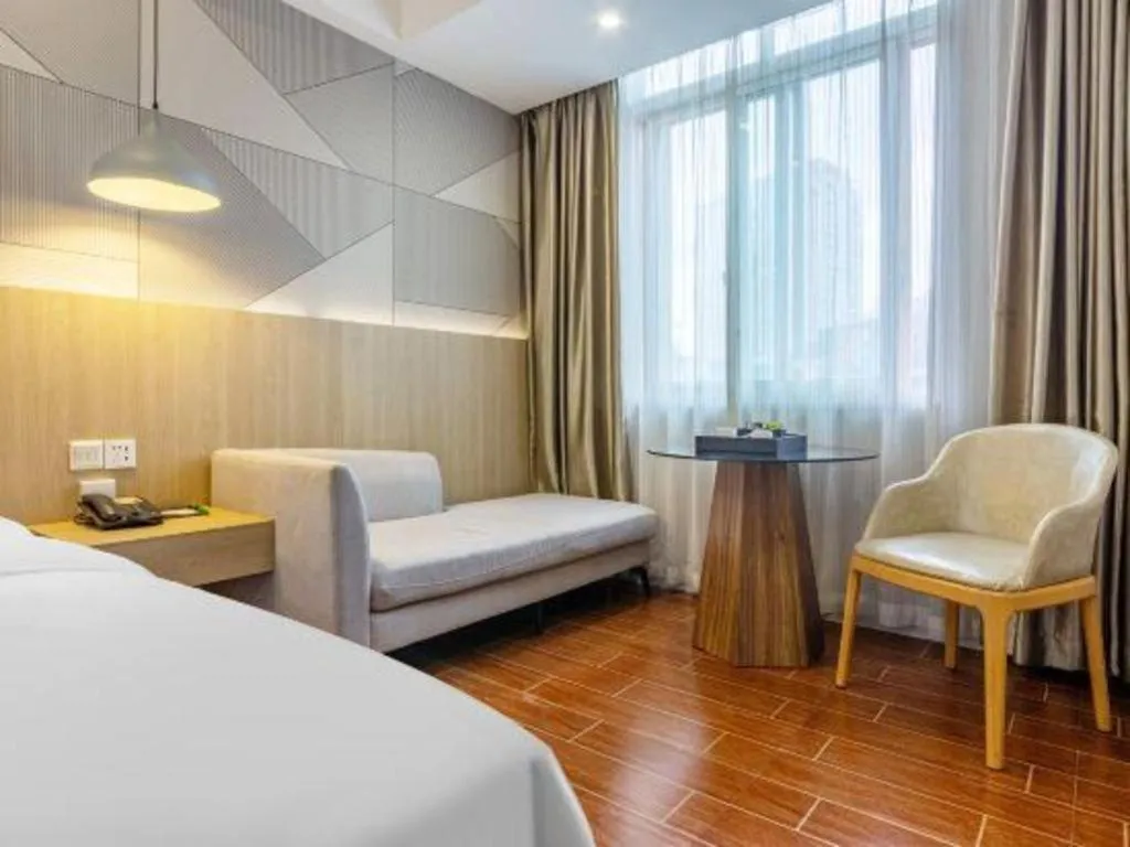 Bed in Borrman Hotel Shaoguan Century East Street Fengcai Building