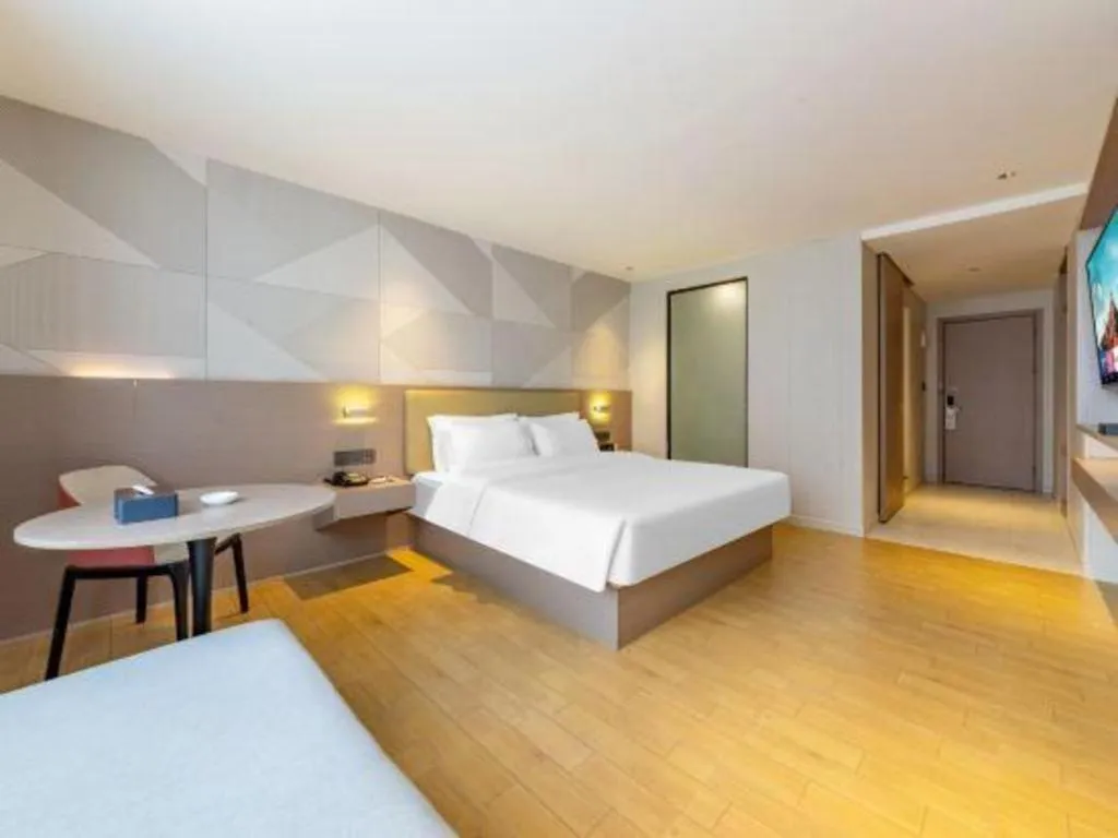 Bed in Borrman Hotel Shaoguan Century East Street Fengcai Building