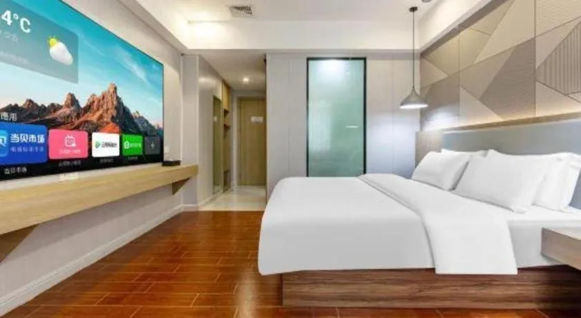 Bed in Borrman Hotel Shaoguan Century East Street Fengcai Building