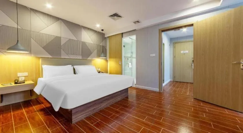 Bed in Borrman Hotel Shaoguan Century East Street Fengcai Building