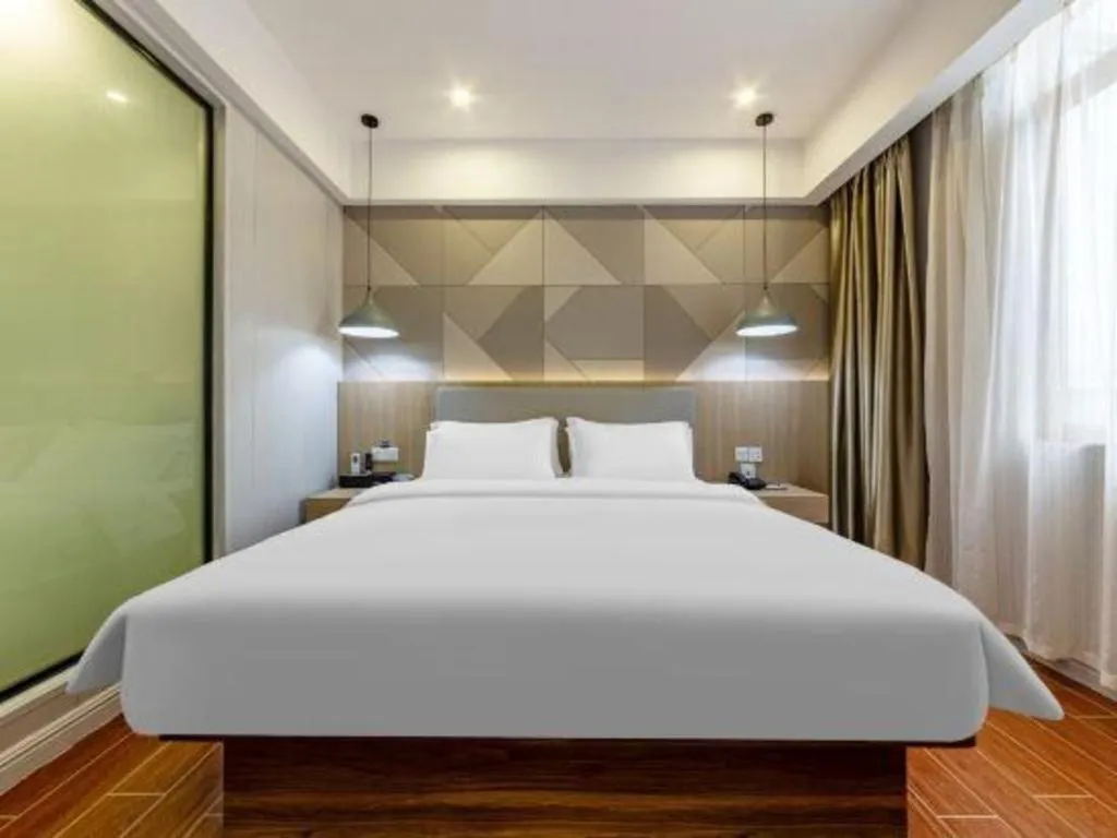 Bed in Borrman Hotel Shaoguan Century East Street Fengcai Building