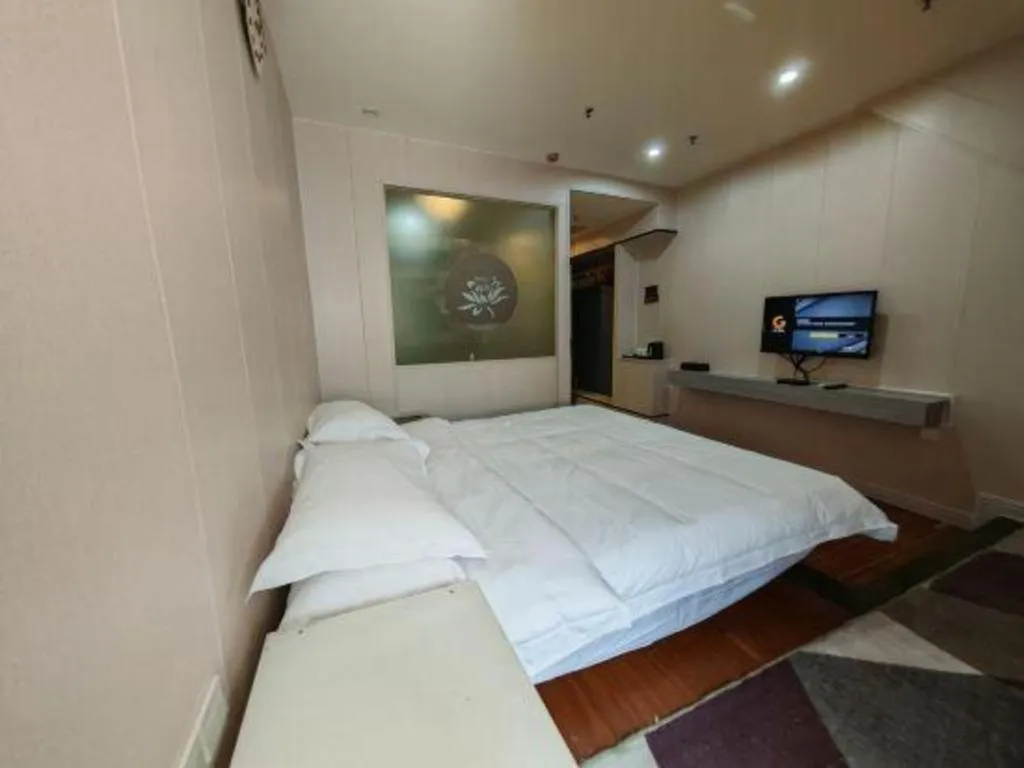 Bed in Borrman Hotel Shaoguan Century East Street Fengcai Building