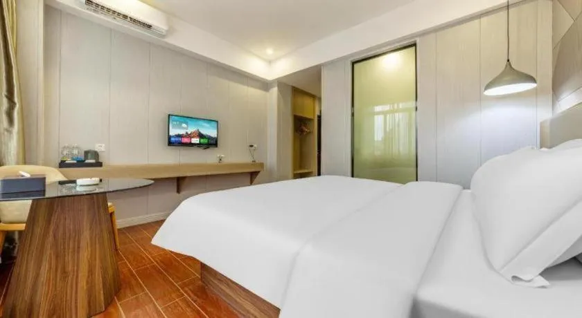 Bed in Borrman Hotel Shaoguan Century East Street Fengcai Building