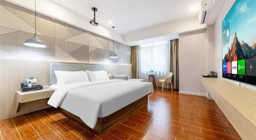 Bed in Borrman Hotel Shaoguan Century East Street Fengcai Building