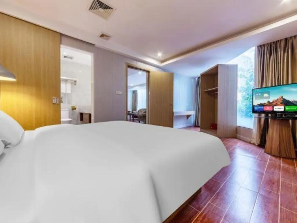 Bed in Borrman Hotel Shaoguan Century East Street Fengcai Building