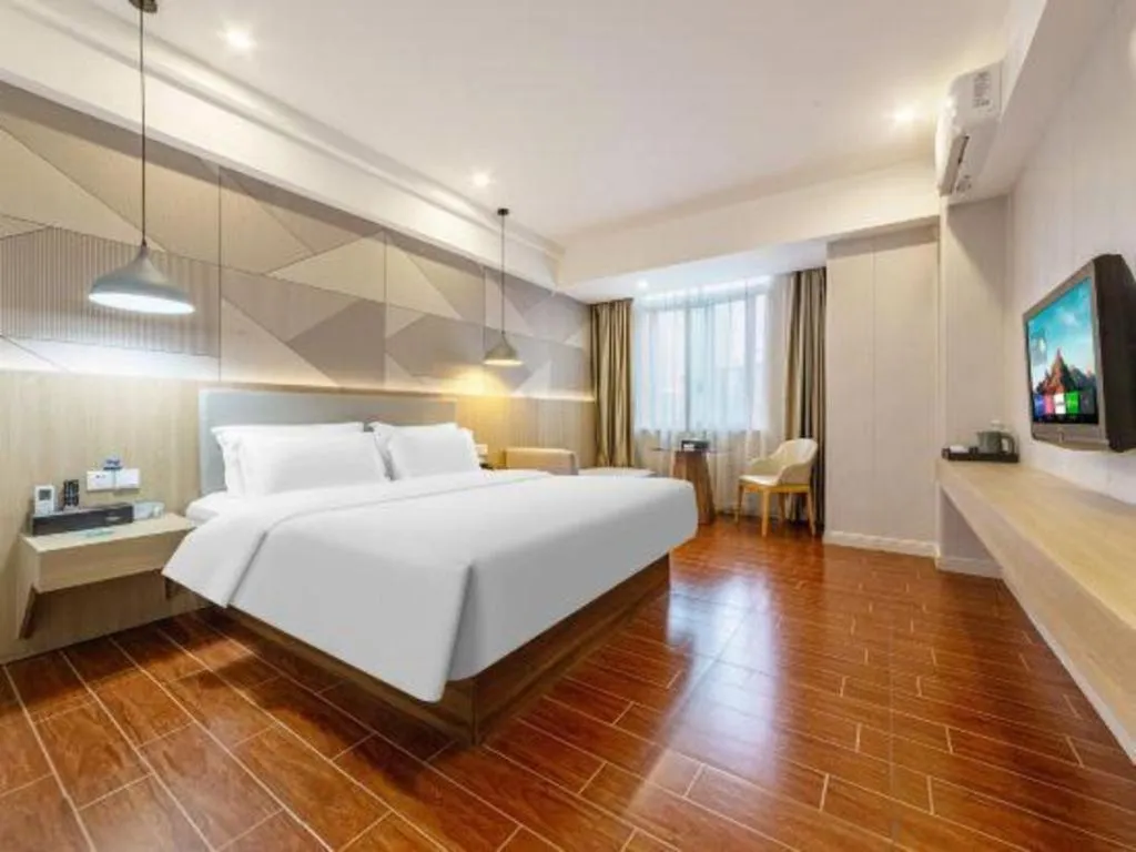 Bed in Borrman Hotel Shaoguan Century East Street Fengcai Building