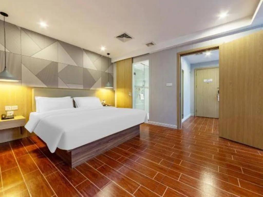 Bed in Borrman Hotel Shaoguan Century East Street Fengcai Building